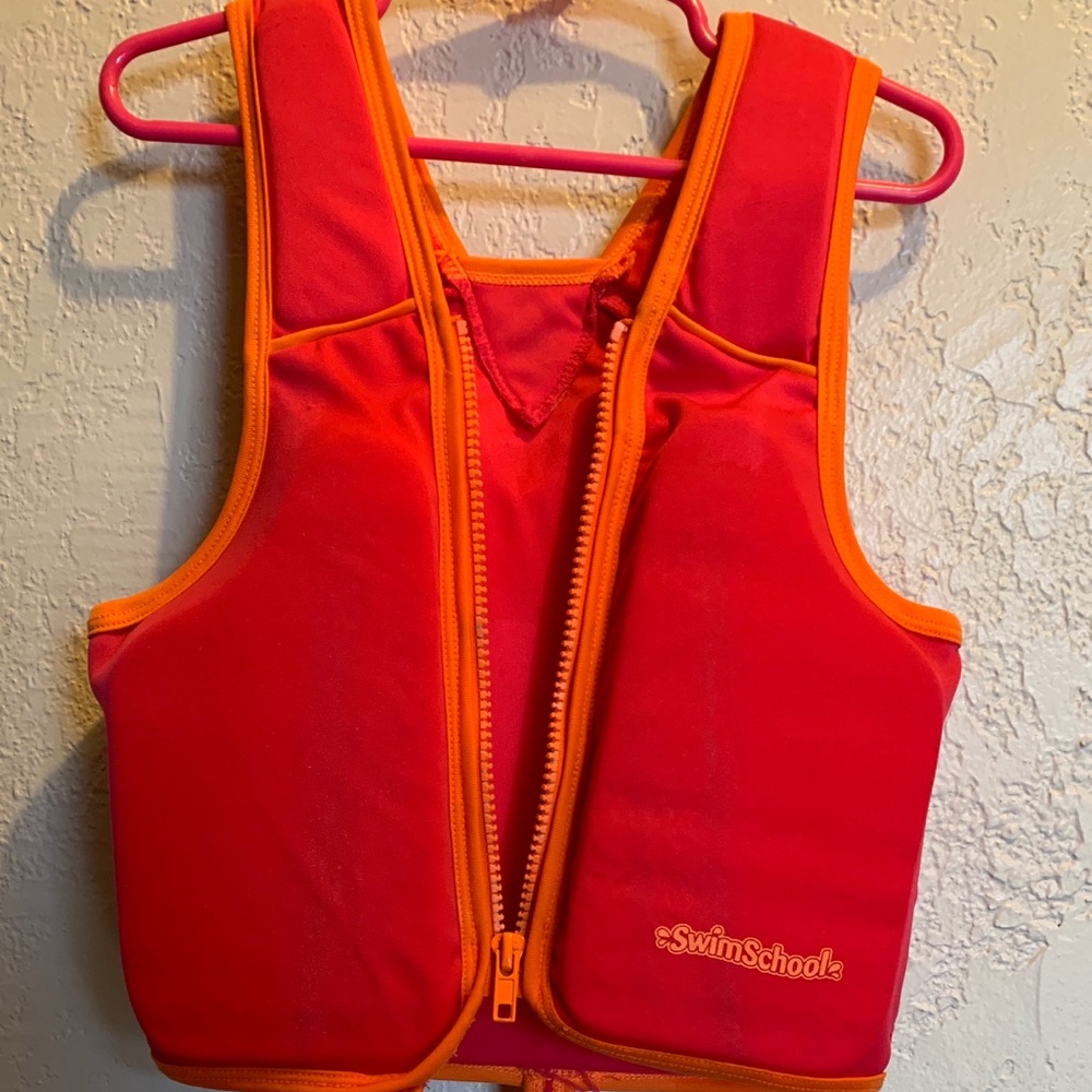 Swims hook child’s life vest
